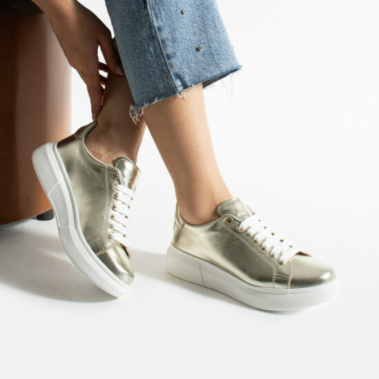Bequeme goldfarbene Ledersneaker für Damen